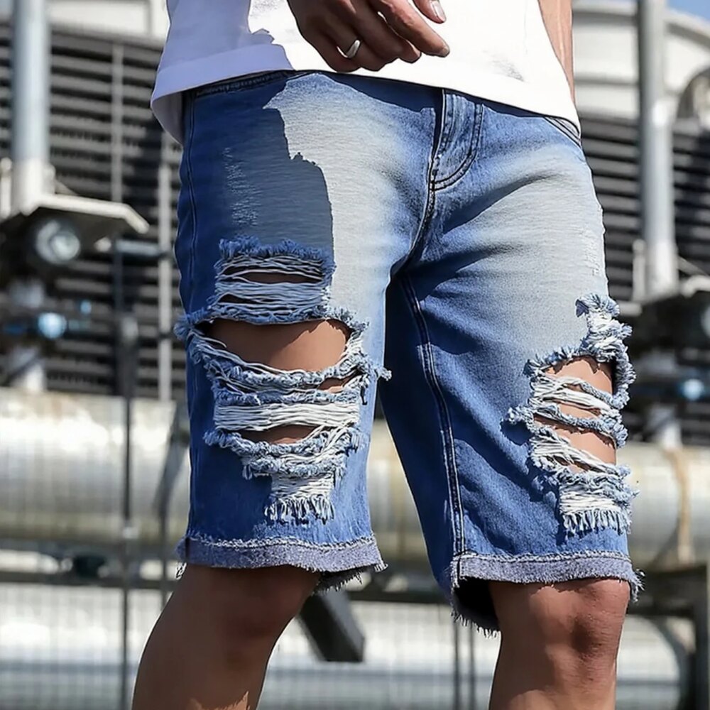 Men's light blue distressed denim shorts, featuring unique frayed edges, trendy and eye-catching, effortlessly creating a street